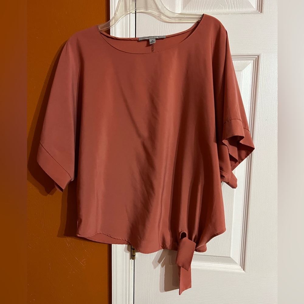 Burnt orange blouse , size medium in very good condition.